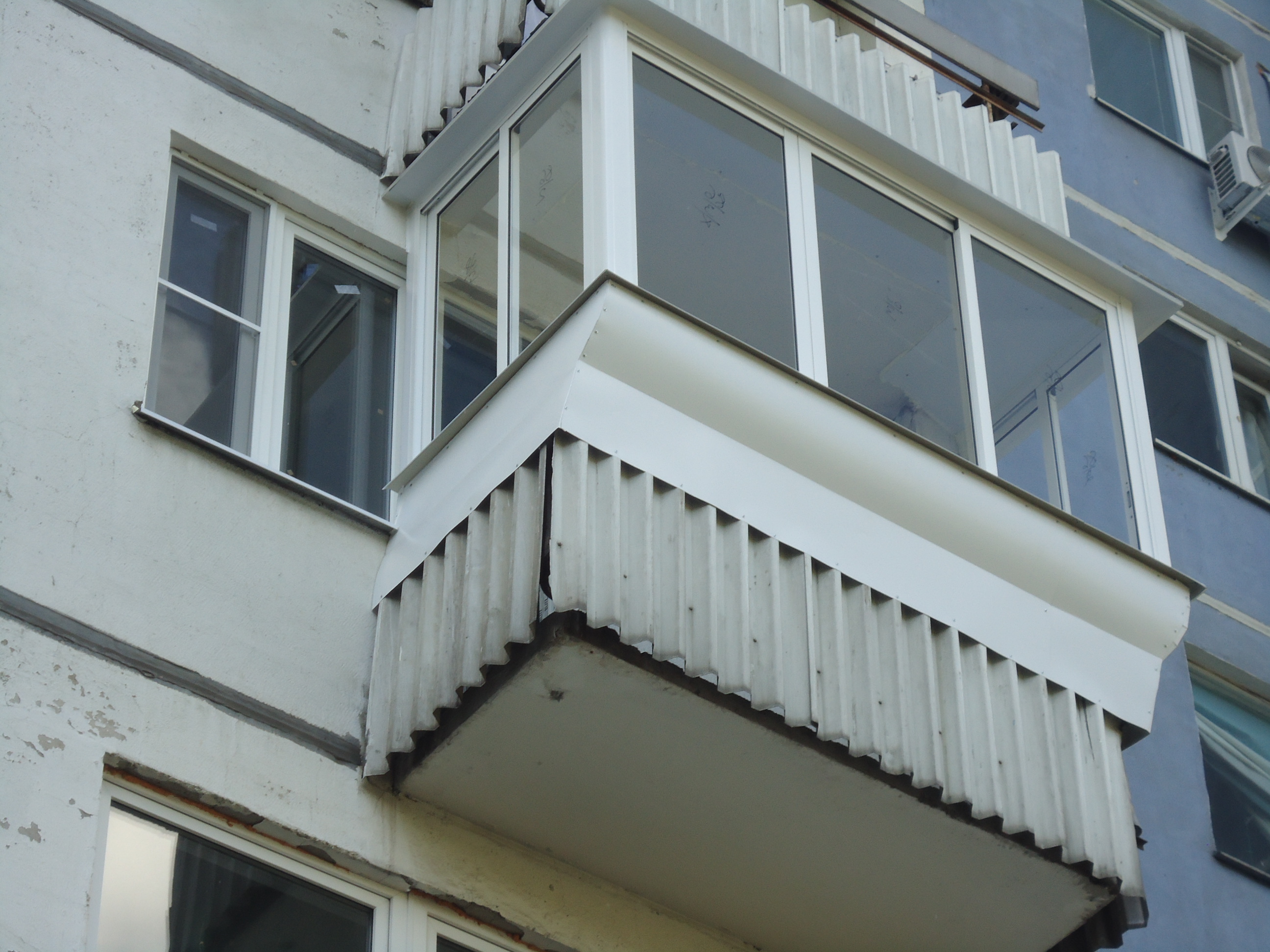 Остекление балконов фото